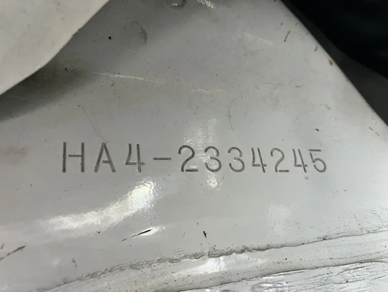 Honda Acty HA4 frame number stamped into the chassis, used to confirm the build date